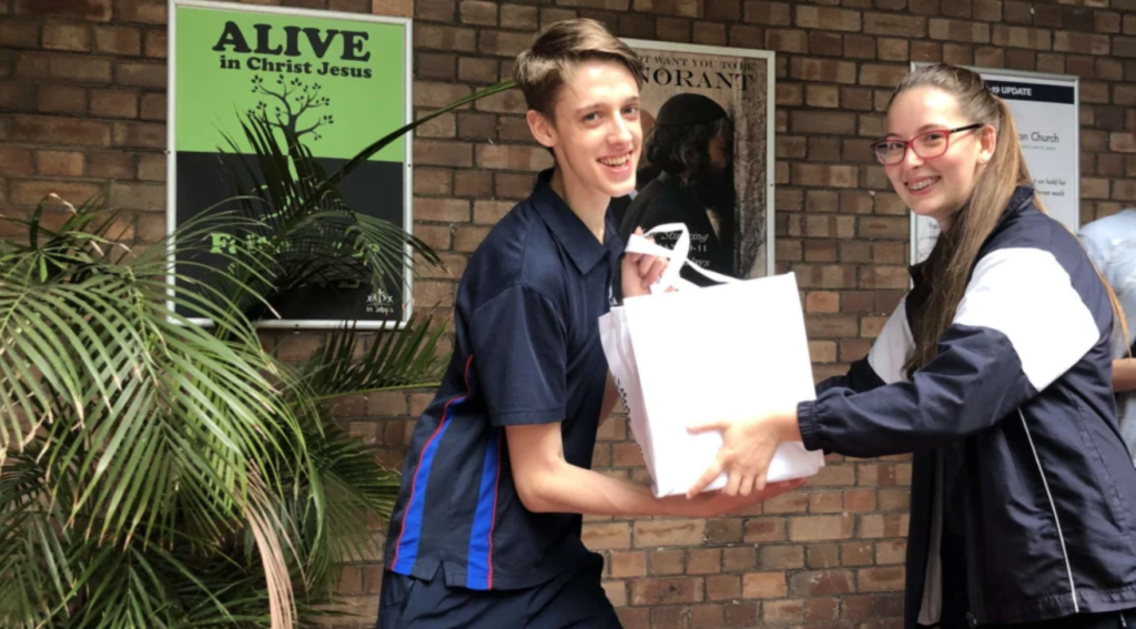 St Andrew’s Cathedral School Students Pack Hampers for Those in Need